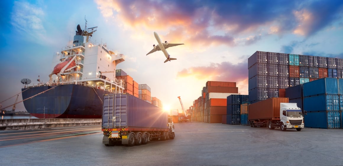 Container truck in ship port for business Logistics and transportation of Container Cargo ship and Cargo plane with working crane bridge in shipyard, logistic import export and transport industry